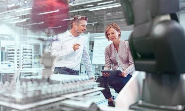 Convergence of IT/OT is enabled through industrial IoT.
